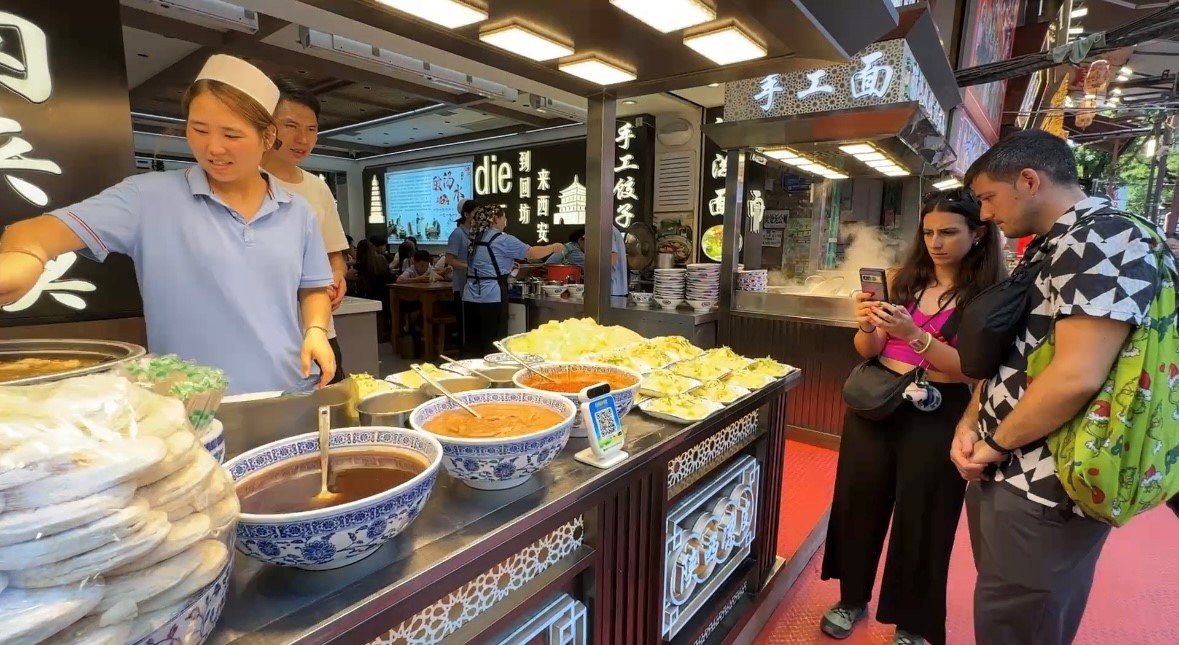 店里的“老外”越来越多了